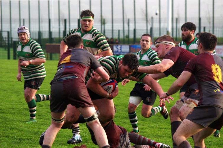 Borderers prop Jimmy Buirds on the charge closely followed by twin brother Scott